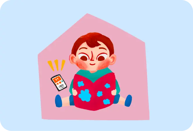 A child reading a book at home, with a phone beside them